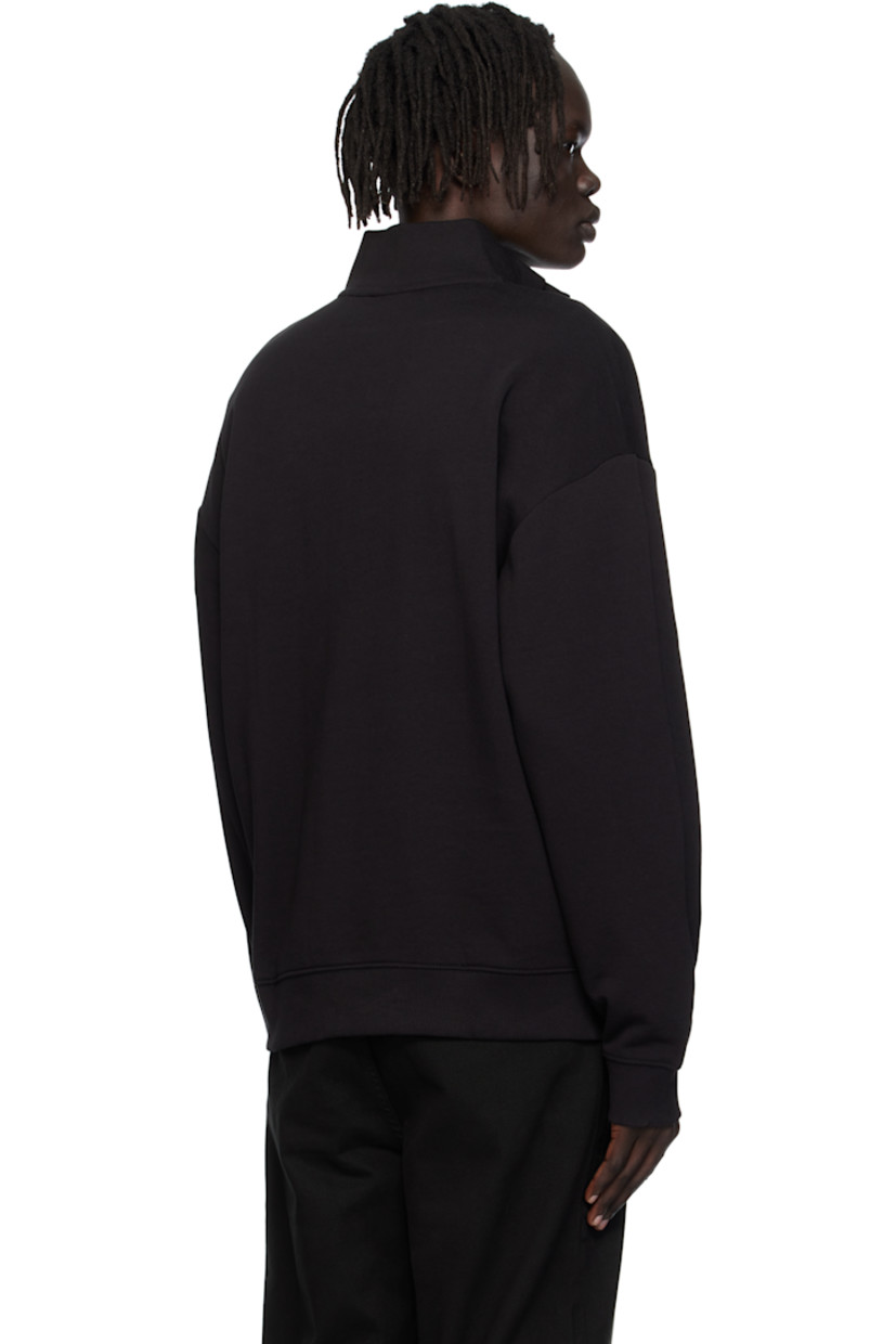 French terry sweatshirt. 

· Rib-knit stand collar, hem, and cuffs
· Half-zip closure
· Bonded logo at chest
· Dropped shoulders

Supplier color: Black