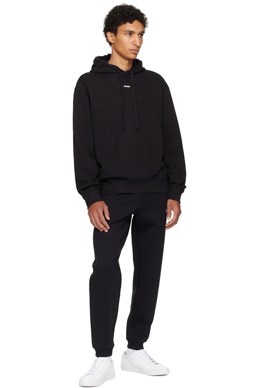 Cotton French terry hoodie

· Drawstring at hood
· Logo printed at chest 
· Rib-knit hem and cuffs
· Dropped shoulders

Supplier color: Black