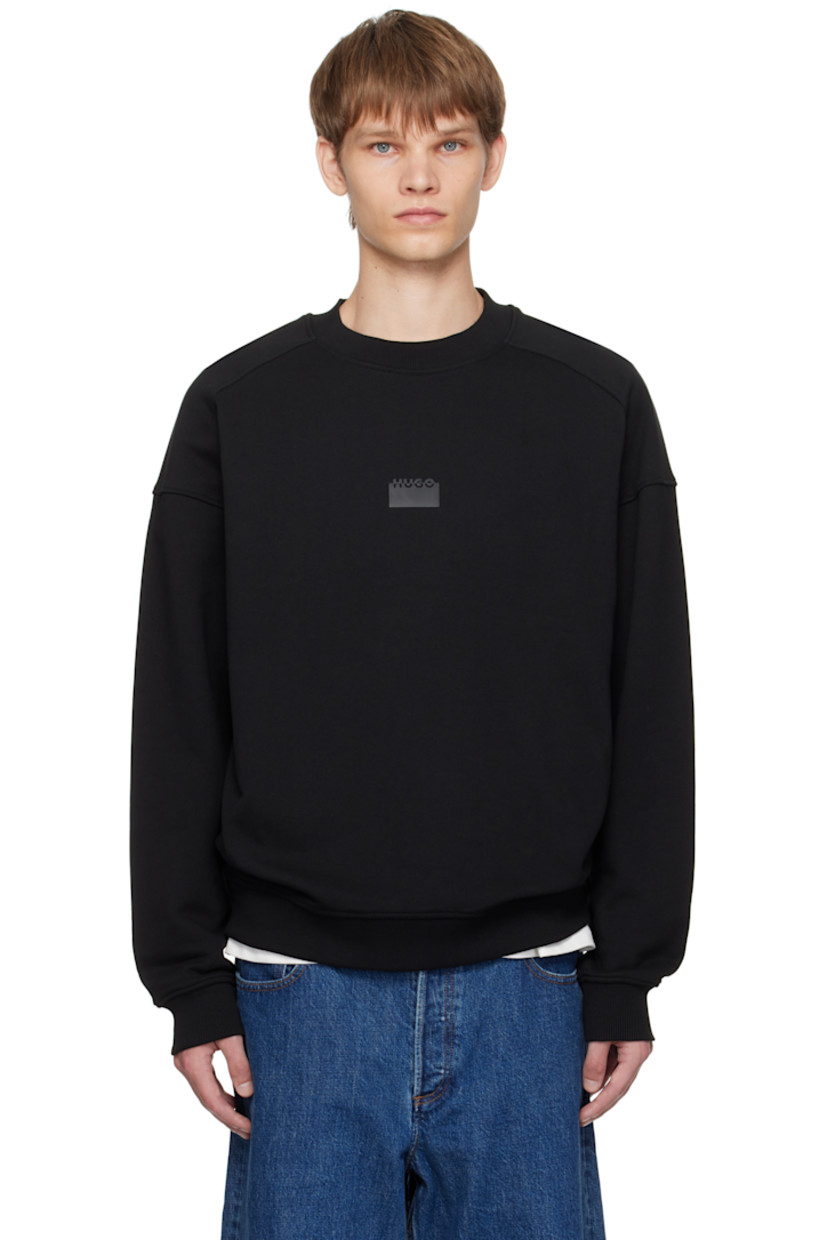 Cotton French terry sweatshirt.

· Rib-knit crewneck, hem, and cuffs
· Logo bonded at chest and back
· Dropped shoulders

Supplier color: Black