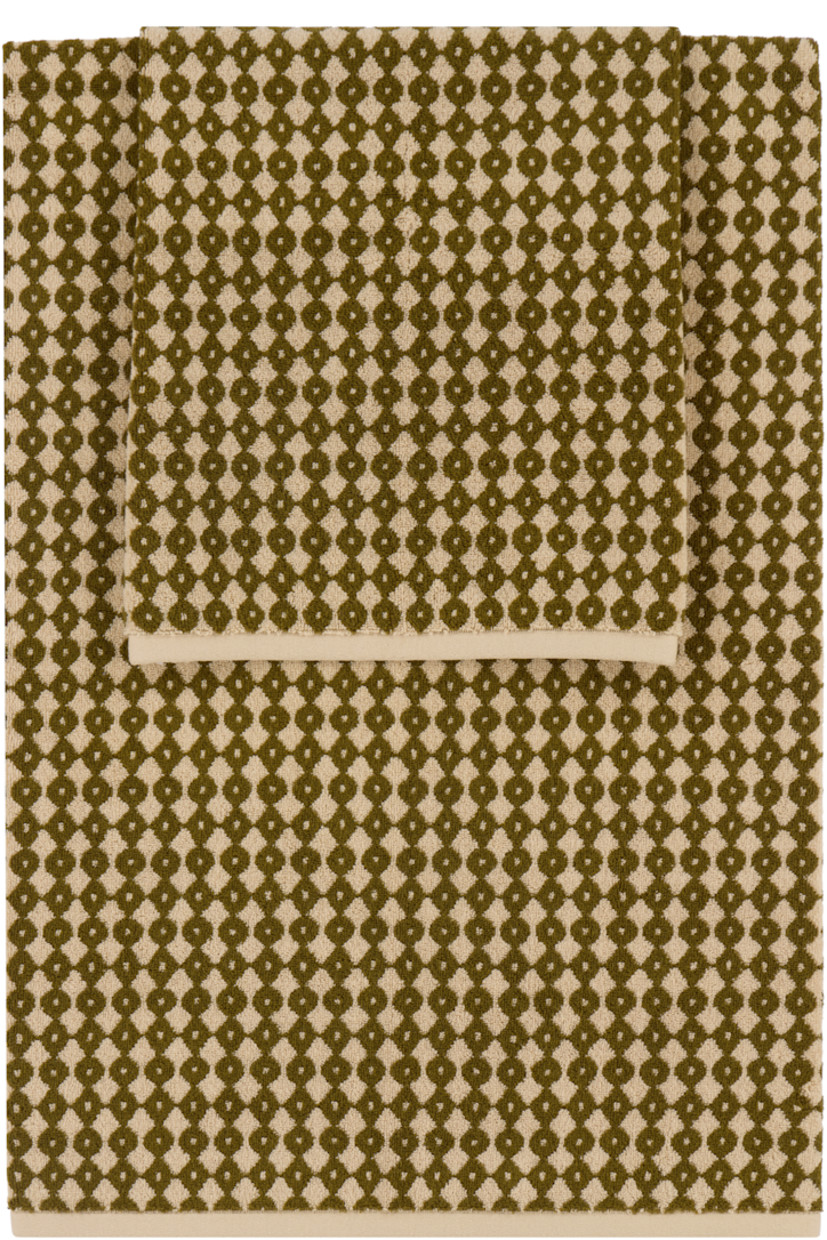 Set of two organic cotton terrycloth towels in beige and khaki. 

· Graphic pattern throughout
· Bath towel: H70 x W140 cm / H28" x W55"
· Hand towel: H45 x W75 cm / H18" x W30"

Part of the Autumn Sonata x Alessandra Williams collaboration.

Supplier color: Olive/Ecru