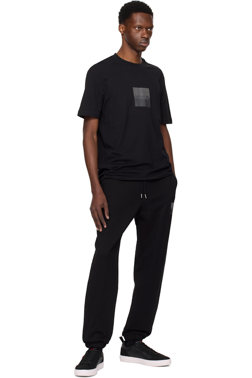 Cotton jersey T-shirt. 

· Rib-knit crewneck
· Logo printed at front 

Supplier color: Black