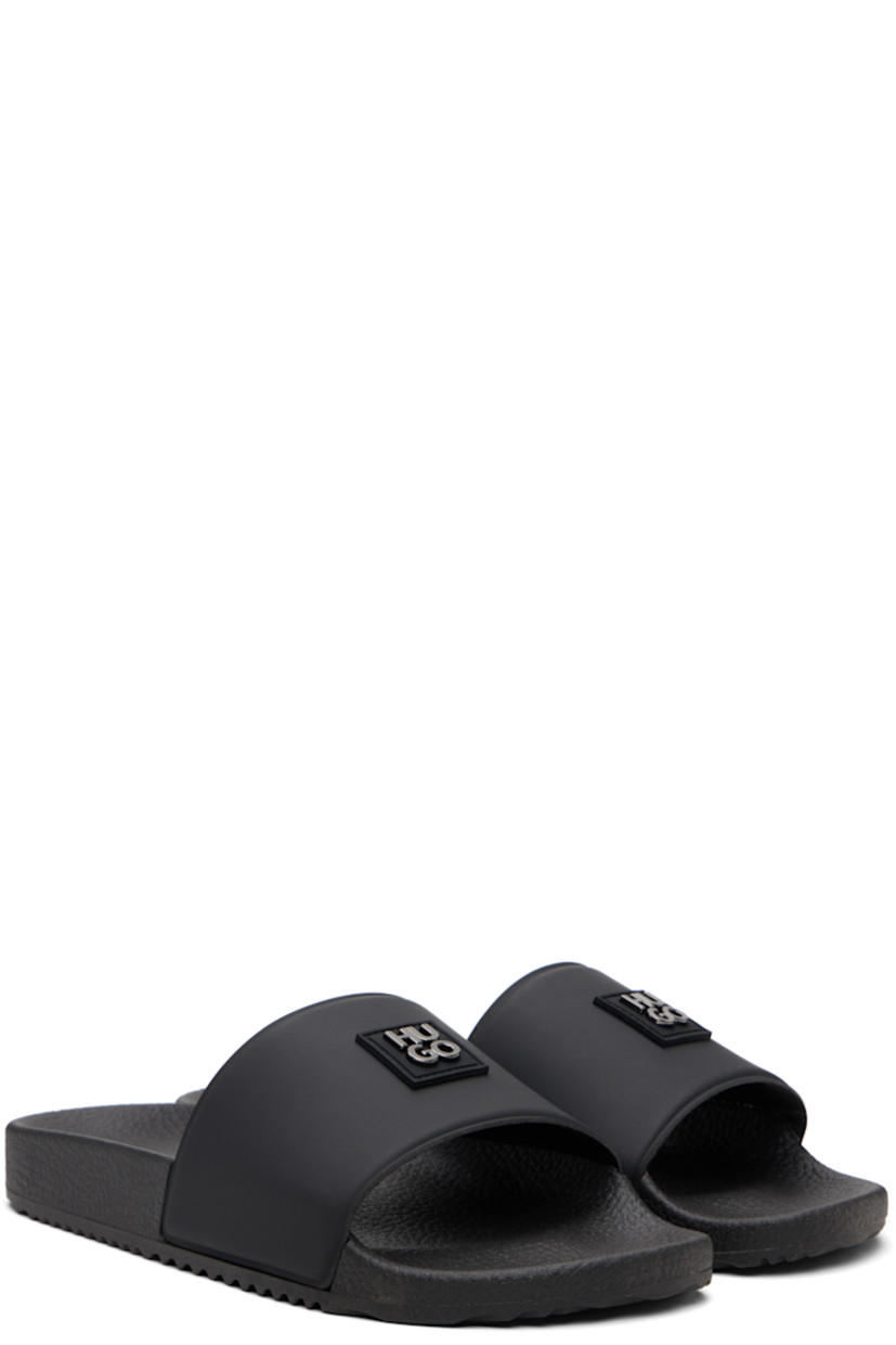 Rubber slides.

· Open toe
· Logo patch at vamp
· Jersey lining
· Treaded rubber sole

Supplier color: Black
