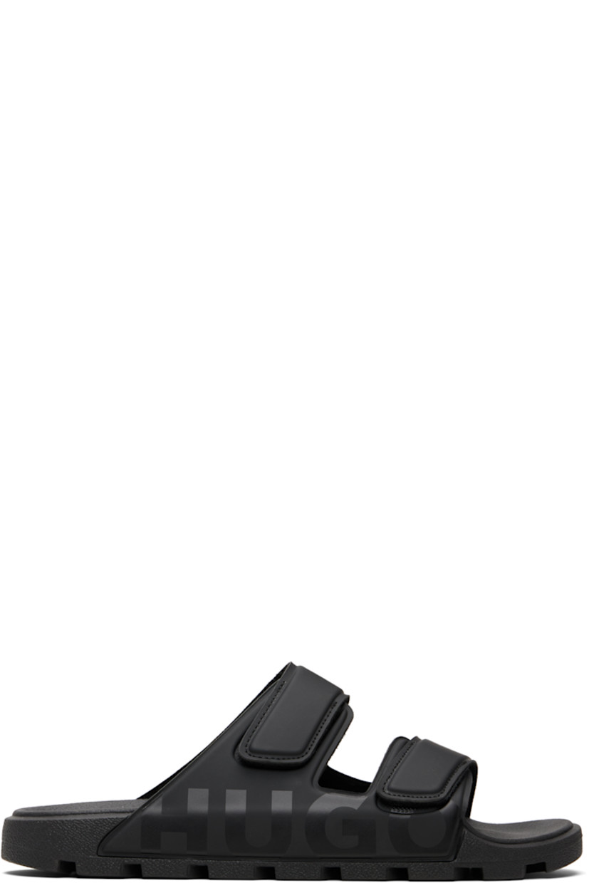 Buffed faux-leather sandals.

· Open toe 
· Velcro straps at vamp
· Logo printed at outer side
· Molded rubber footbed 
· Treaded rubber sole 

Supplier color: Black