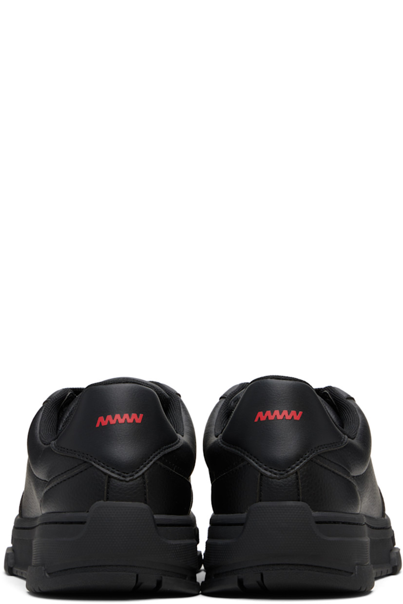 Low-top grained faux-leather sneakers.

· Perforations at toe
· Lace-up closure
· Padded tongue and collar
· Logo embossed at tongue and outer side
· Eyelets at inner side
· Graphic bonded at heel tab
· Mesh lining
· Treaded rubber sole

Supplier color: Black