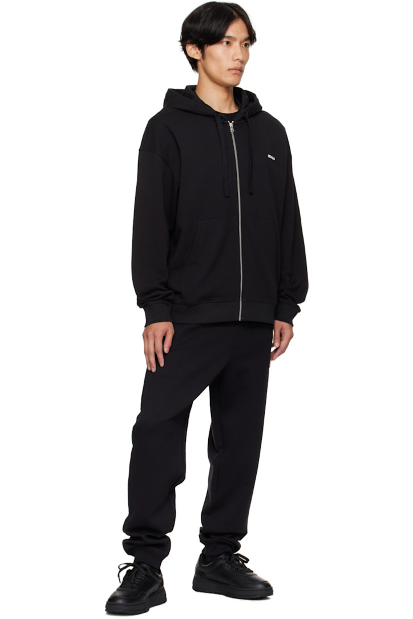 Low-top grained faux-leather sneakers.

· Perforations at toe
· Lace-up closure
· Padded tongue and collar
· Logo embossed at tongue and outer side
· Eyelets at inner side
· Graphic bonded at heel tab
· Mesh lining
· Treaded rubber sole

Supplier color: Black