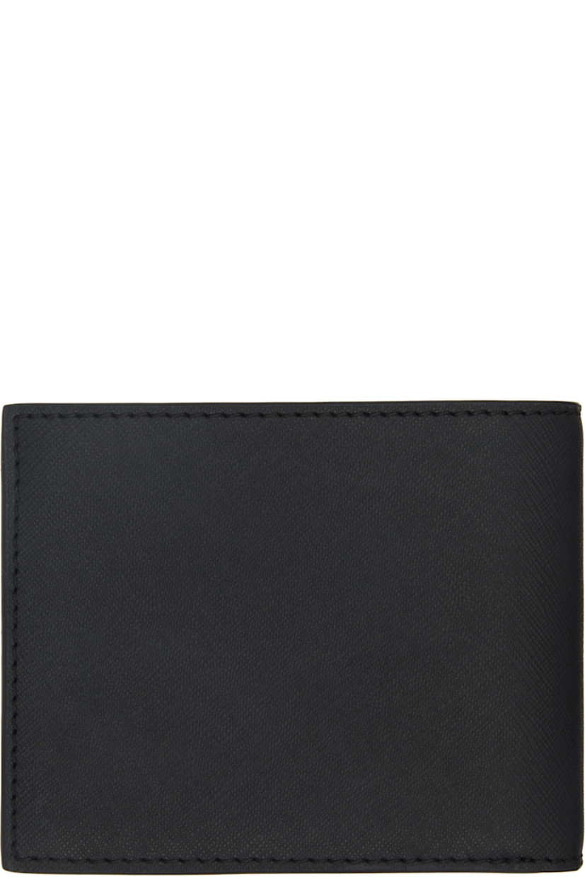Saffiano leather trifold wallet in black. 

· Logo stamp at face
· Two patch pockets at interior 
· Mesh ID slot and eight card slots
· Coin compartment and two note slots
· Twill lining
· H3.5" x W4.5" x D1"

Supplier color: Black