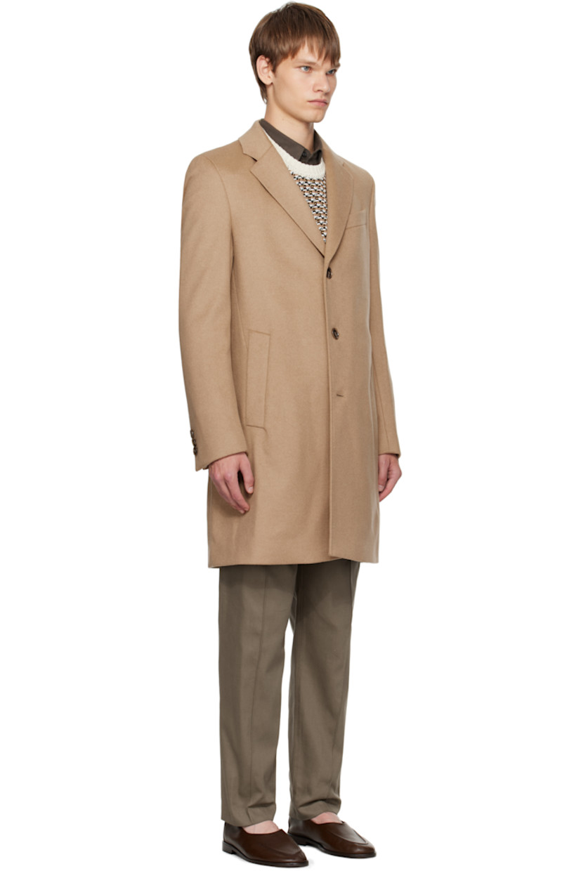Recycled wool- and recycled cashmere-blend melton coat.

· Notched lapel
· Button closure
· Welt pockets at front
· Surgeon's cuffs
· Central vent at back hem
· Welt pocket at interior
· Full satin lining

Supplier color: Beige