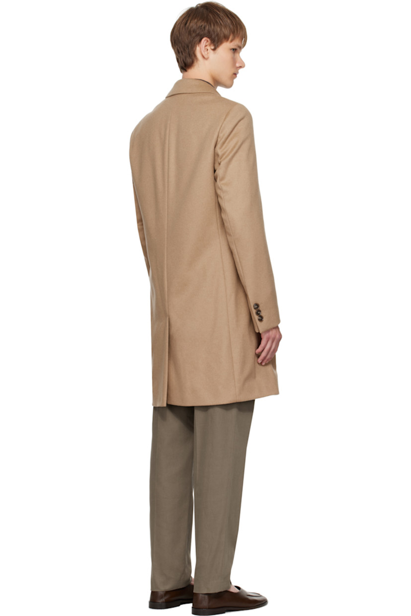 Recycled wool- and recycled cashmere-blend melton coat.

· Notched lapel
· Button closure
· Welt pockets at front
· Surgeon's cuffs
· Central vent at back hem
· Welt pocket at interior
· Full satin lining

Supplier color: Beige