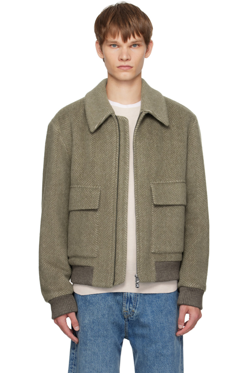 Insulated alpaca-blend melton jacket.

· Herringbone pattern throughout
· Spread collar
· Two-way zip closure
· Flap and welt pockets at front
· Rib-knit hem and cuffs
· Welt pocket at interior
· Full poplin and satin lining

Supplier color: Light brown