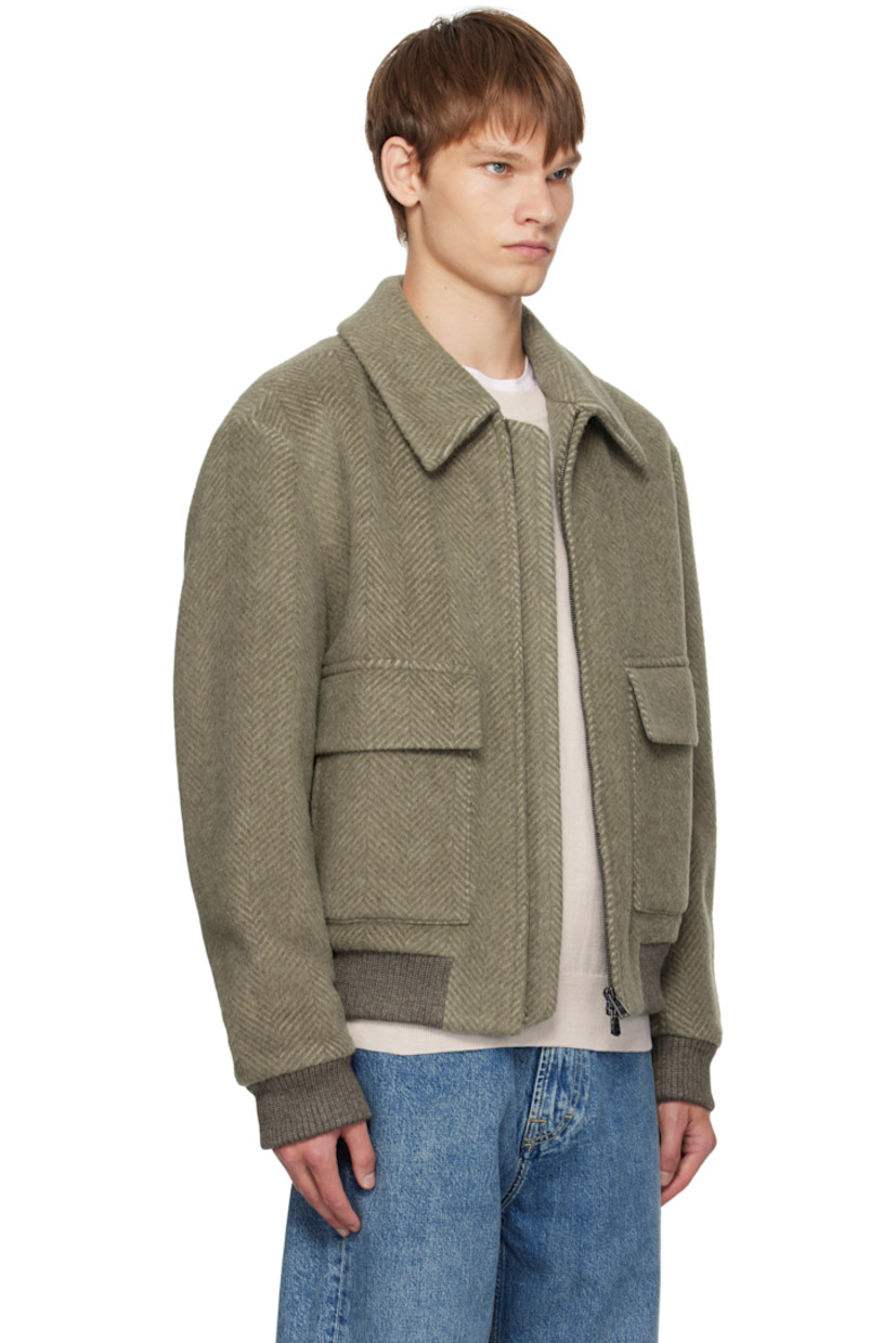 Insulated alpaca-blend melton jacket.

· Herringbone pattern throughout
· Spread collar
· Two-way zip closure
· Flap and welt pockets at front
· Rib-knit hem and cuffs
· Welt pocket at interior
· Full poplin and satin lining

Supplier color: Light brown
