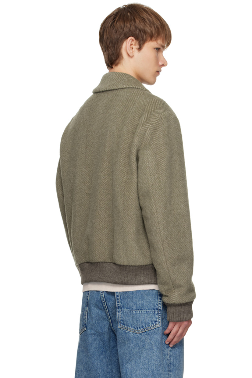 Insulated alpaca-blend melton jacket.

· Herringbone pattern throughout
· Spread collar
· Two-way zip closure
· Flap and welt pockets at front
· Rib-knit hem and cuffs
· Welt pocket at interior
· Full poplin and satin lining

Supplier color: Light brown