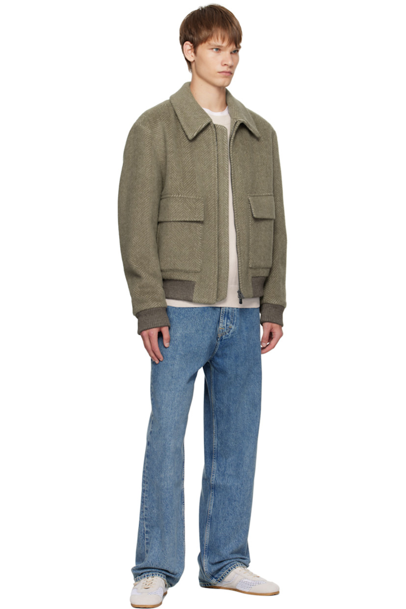 Insulated alpaca-blend melton jacket.

· Herringbone pattern throughout
· Spread collar
· Two-way zip closure
· Flap and welt pockets at front
· Rib-knit hem and cuffs
· Welt pocket at interior
· Full poplin and satin lining

Supplier color: Light brown