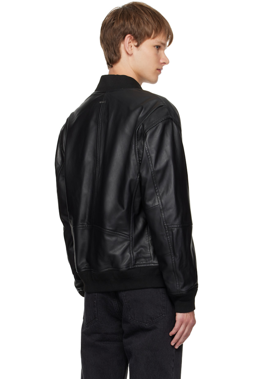 Grained leather jacket.

· Rib-knit stand collar, hem, and cuffs
· Zip closure
· Zip pockets at front
· Logo hardware at back collar
· Welt pocket at interior
· Full satin lining

Supplier color: Black