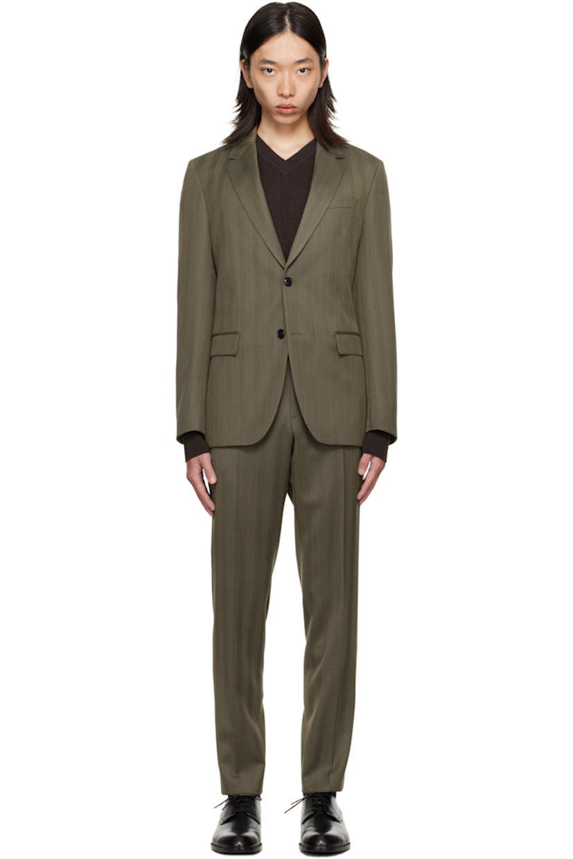 Herringbone stretch wool-blend suit.

· Notched lapel
· Button closure
· Flap pockets at waist
· Full satin lining
· Belt loops at waistband
· Four-pocket styling
· Zip fly
· Creased legs
· Knee-length satin lining

Supplier color: Open brown