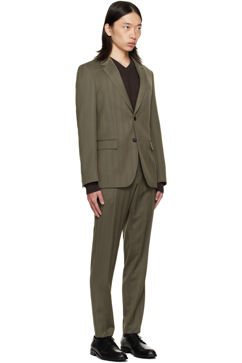Herringbone stretch wool-blend suit.

· Notched lapel
· Button closure
· Flap pockets at waist
· Full satin lining
· Belt loops at waistband
· Four-pocket styling
· Zip fly
· Creased legs
· Knee-length satin lining

Supplier color: Open brown