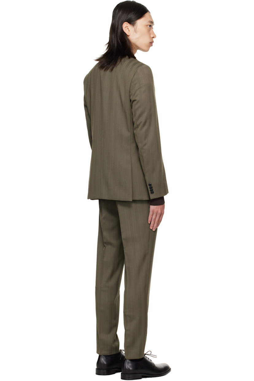 Herringbone stretch wool-blend suit.

· Notched lapel
· Button closure
· Flap pockets at waist
· Full satin lining
· Belt loops at waistband
· Four-pocket styling
· Zip fly
· Creased legs
· Knee-length satin lining

Supplier color: Open brown