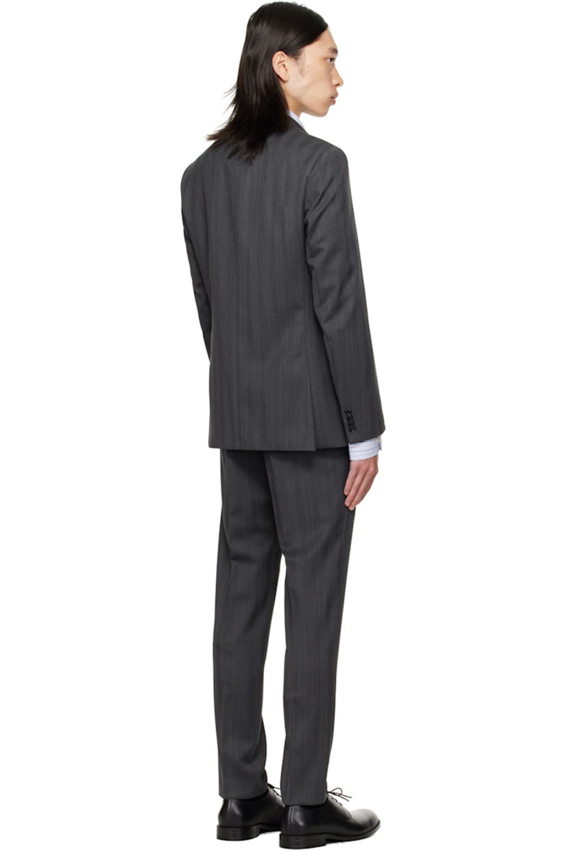 Herringbone stretch wool-blend suit.

· Notched lapel
· Button closure
· Flap pockets at waist
· Full satin lining
· Belt loops at waistband
· Four-pocket styling
· Zip fly
· Creased legs
· Knee-length satin lining

Supplier color: Medium grey