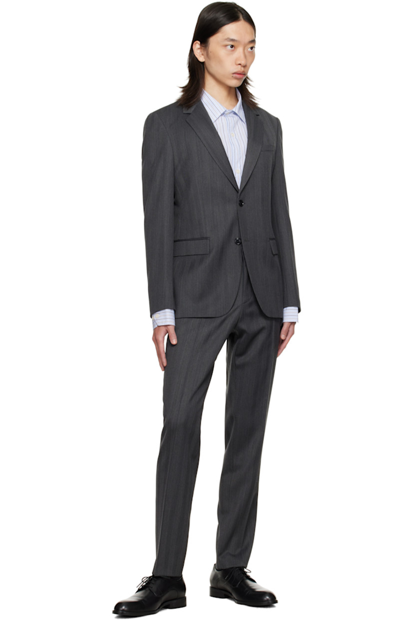 Herringbone stretch wool-blend suit.

· Notched lapel
· Button closure
· Flap pockets at waist
· Full satin lining
· Belt loops at waistband
· Four-pocket styling
· Zip fly
· Creased legs
· Knee-length satin lining

Supplier color: Medium grey