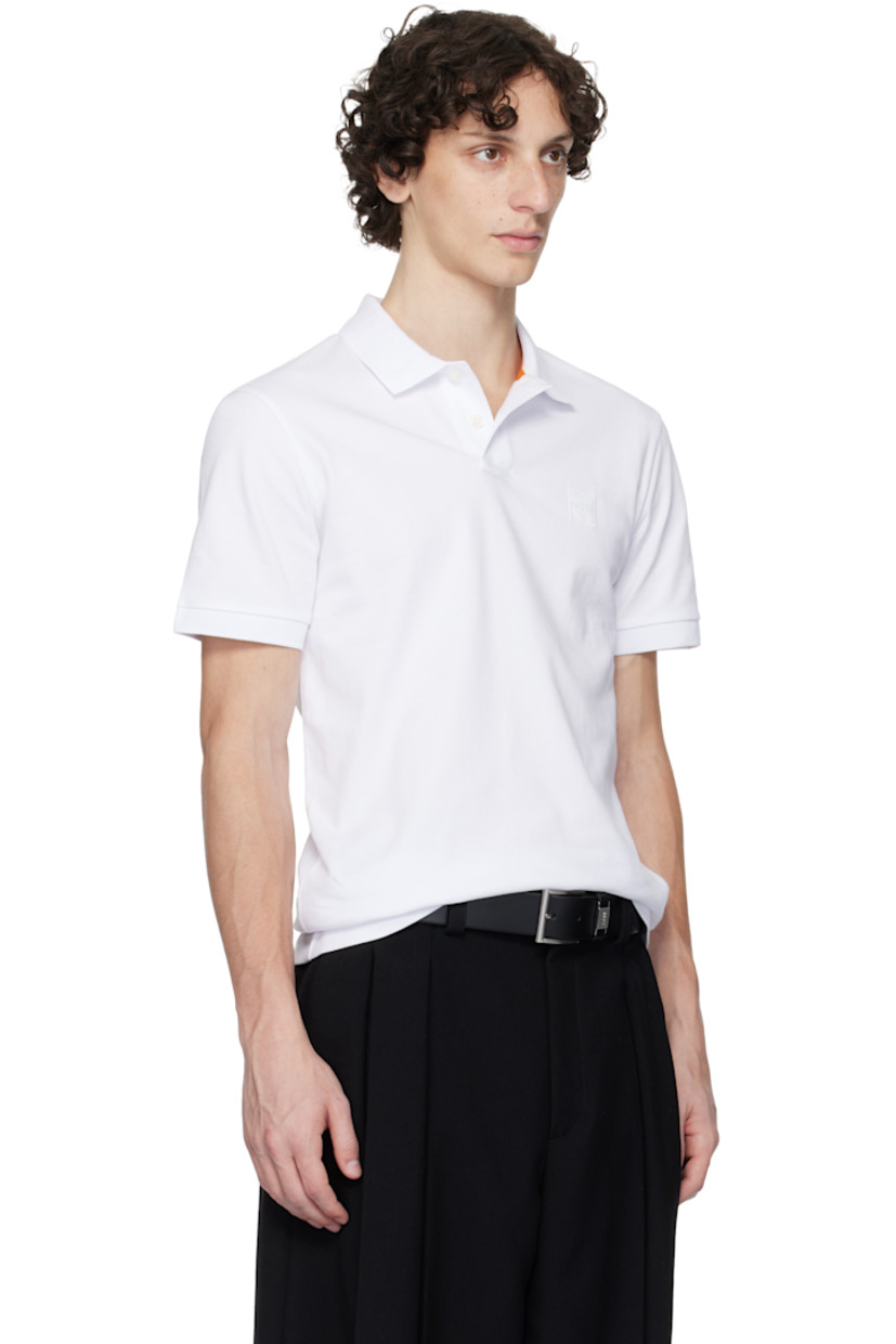 Stretch cotton piqué polo.

· Rib-knit spread collar and cuffs
· Two-button placket
· Logo patch at chest

Supplier color: White