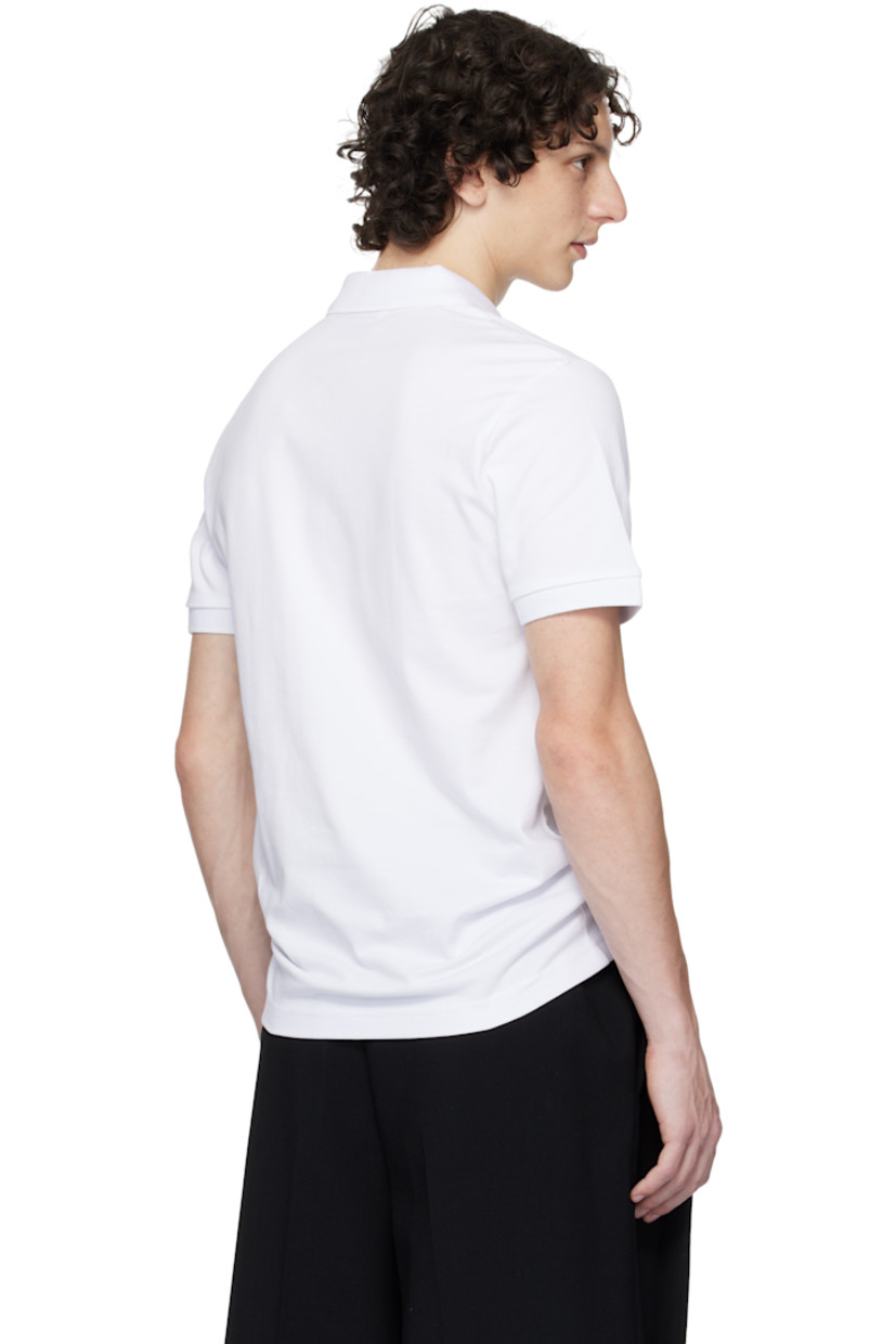 Stretch cotton piqué polo.

· Rib-knit spread collar and cuffs
· Two-button placket
· Logo patch at chest

Supplier color: White