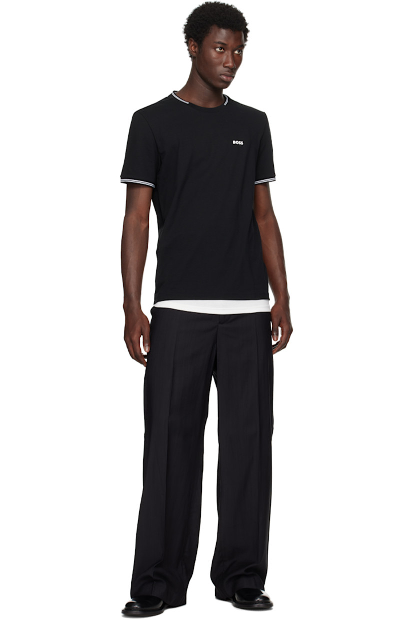 Stretch cotton piqué T-shirt.

· Rib-knit crewneck and cuffs
· Rubberized logo bonded at chest
· Contrast stitching in white

 Supplier color: Black