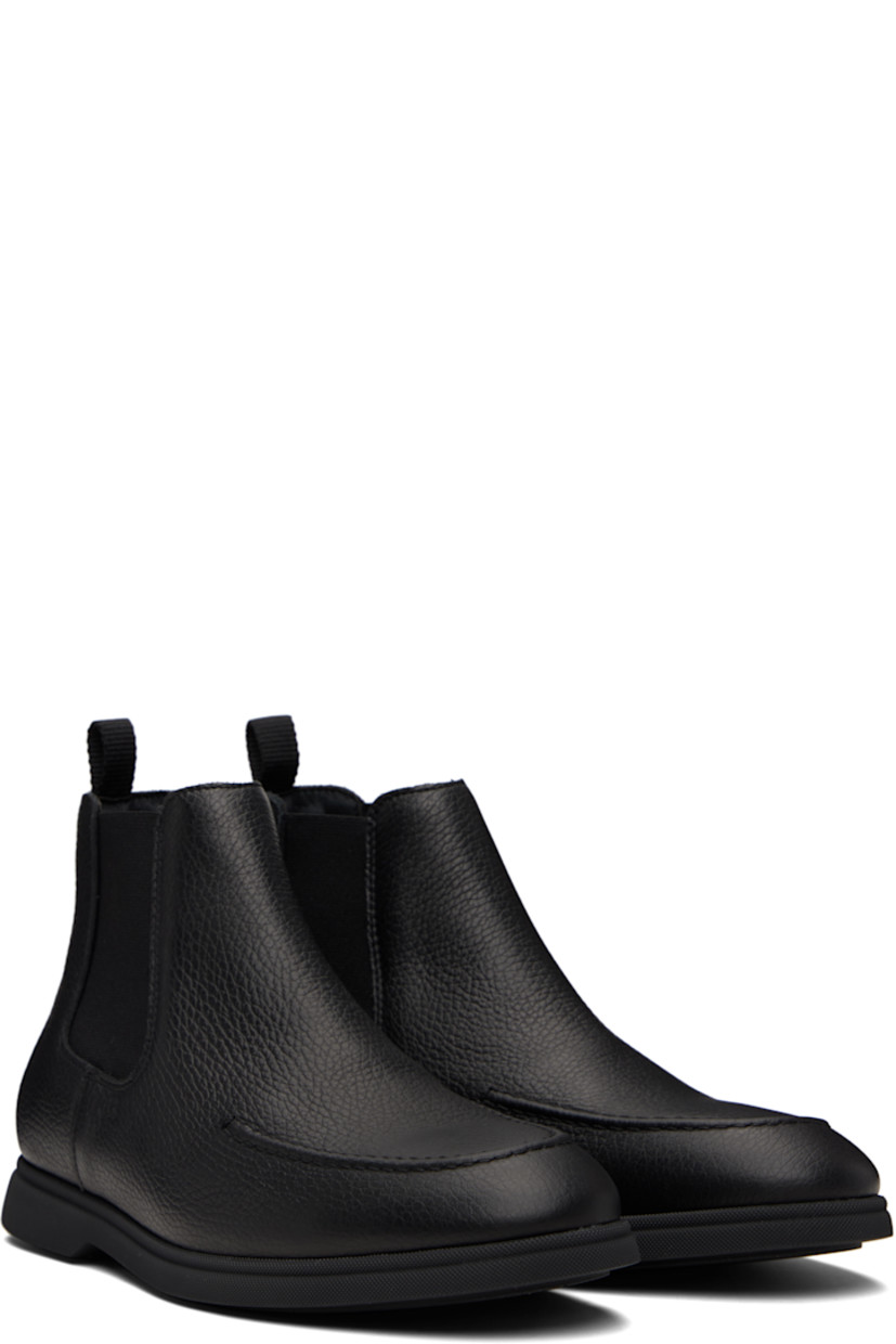 Ankle-high grained leather Chelsea boots.

· Moc toe
· Elasticized gusset at sides
· Logo embossed at outer side
· Pull-loop at heel collar
· Buffed leather lining
· Treaded rubber sole

Supplier color: Black