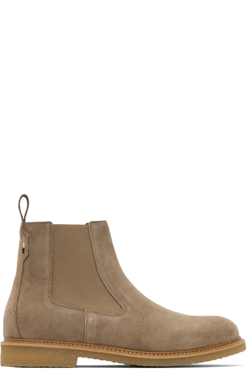 Ankle-high faux-suede Chelsea boots.

· Elasticized gusset at sides
· Woven pull-loop at heel collar
· Topstitching at welt
· Treaded crêpe rubber sole

Supplier color: Beige