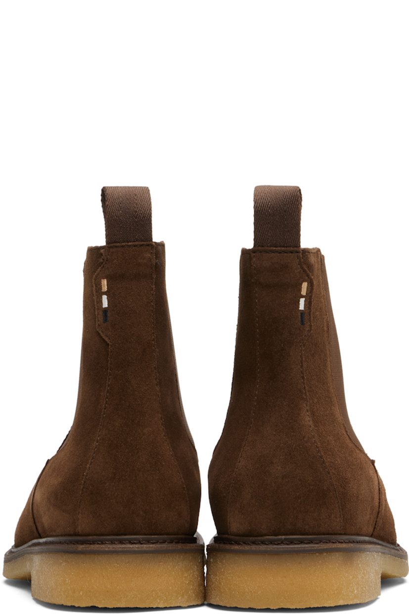 Ankle-high faux-suede Chelsea boots.

· Elasticized gusset at sides
· Pull-loop at heel collar 
· Logo embroidered at heel tab
· Crêpe-rubber sole 

Supplier color: Dark brown