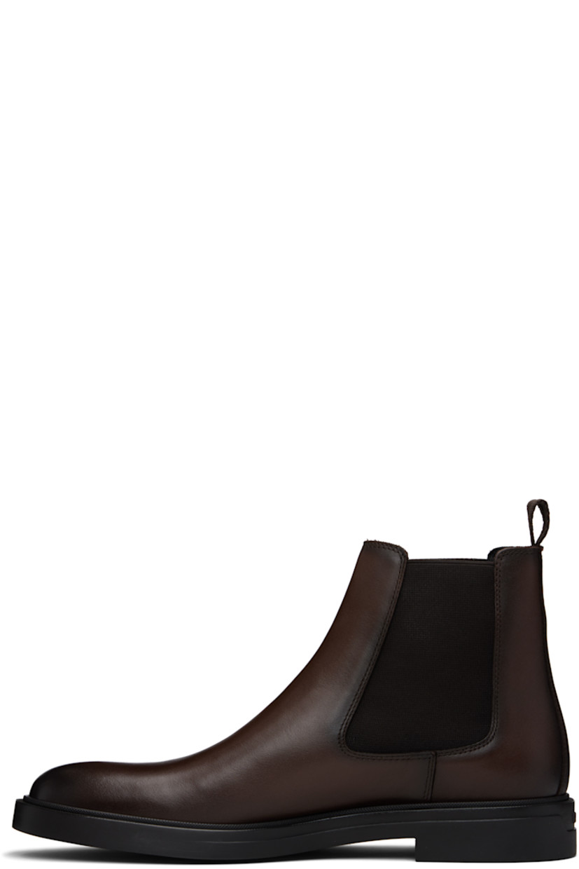 Ankle-high buffed leather Chelsea boots.

· Elasticized gusset at sides
· Logo embroidered at outer side
· Pull-loop at heel collar
· Logo embossed at heel
· Buffed leather lining
· Treaded rubber sole

Supplier color: Dark Brown