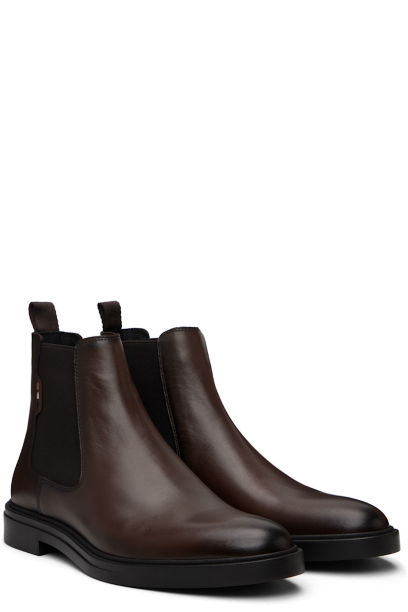 Ankle-high buffed leather Chelsea boots.

· Elasticized gusset at sides
· Logo embroidered at outer side
· Pull-loop at heel collar
· Logo embossed at heel
· Buffed leather lining
· Treaded rubber sole

Supplier color: Dark Brown