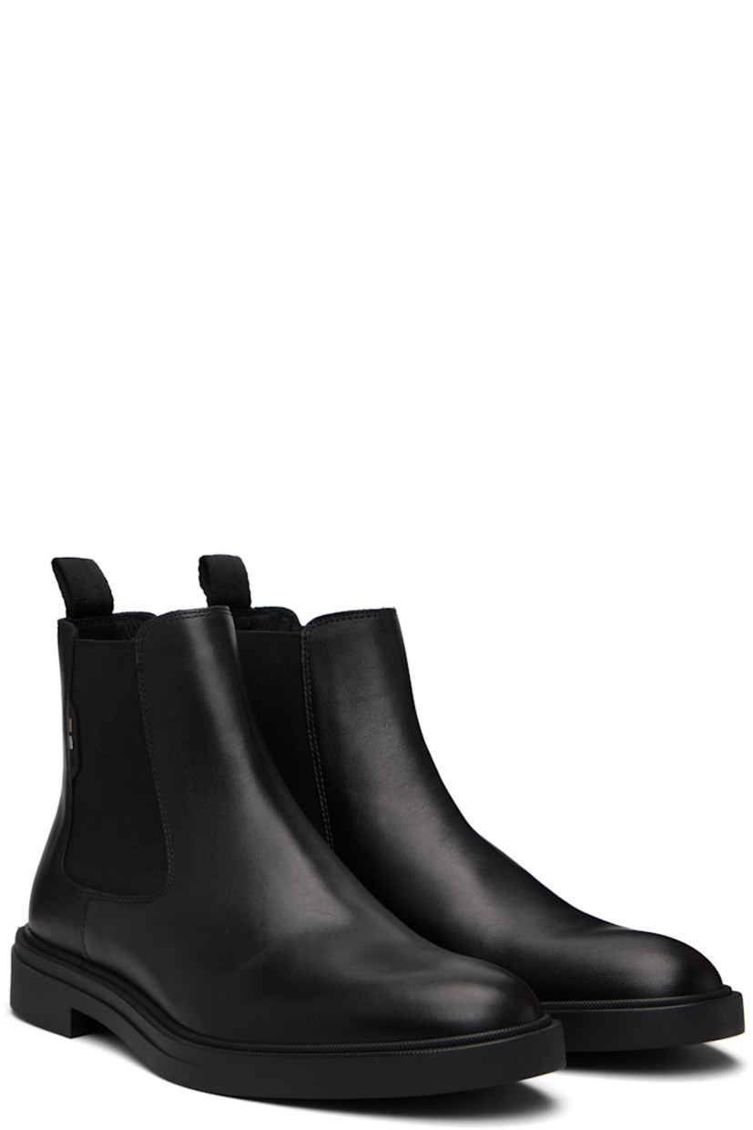 Ankle-high grained nappa leather Chelsea boots. 

· Elasticized gusset at sides
· Logo stripes embroidered at outer side
· Pull-loop at heel collar
· Logo embossed at heel
· Grained leather lining
· Treaded rubber sole

Supplier color: Black