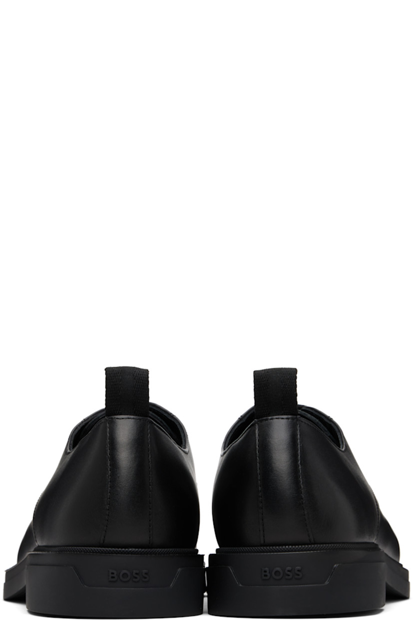 Buffed leather derbys.

· Lace-up closure
· Pull-loop at heel collar
· Logo embossed at heel
· Suede and grained leather lining
· Treaded rubber sole

Supplier color: Black