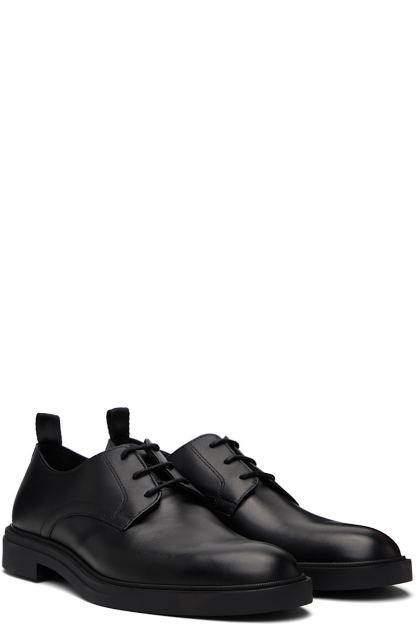 Buffed leather derbys.

· Lace-up closure
· Pull-loop at heel collar
· Logo embossed at heel
· Suede and grained leather lining
· Treaded rubber sole

Supplier color: Black