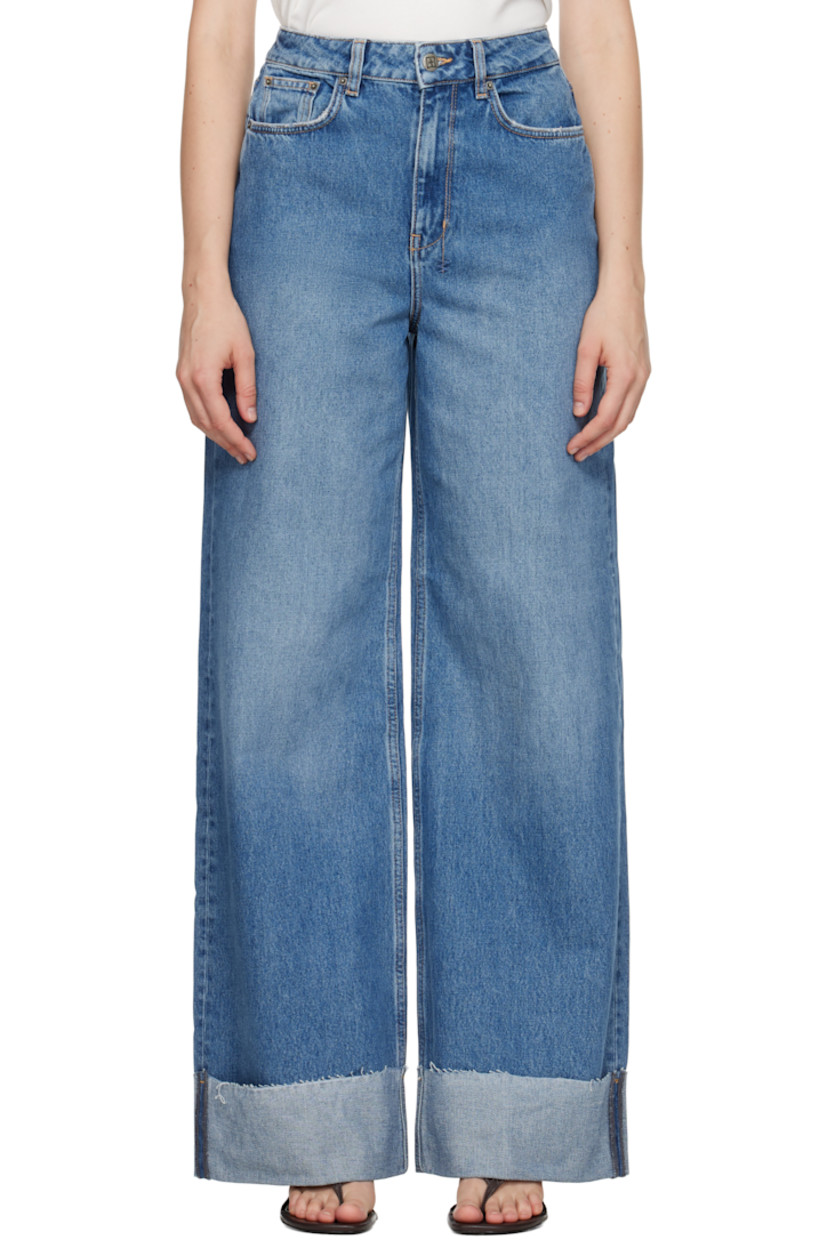 Non-stretch denim jeans.

· Fading and distressing throughout
· Wide-leg
· High-rise
· Belt loops
· Five-pocket styling
· Zip fly
· Rolled cuffs
· Logos embroidered at back waistband and leg
· Logo-engraved antiqued silver-tone hardware
· Contrast stitching in beige

Supplier color: Denim