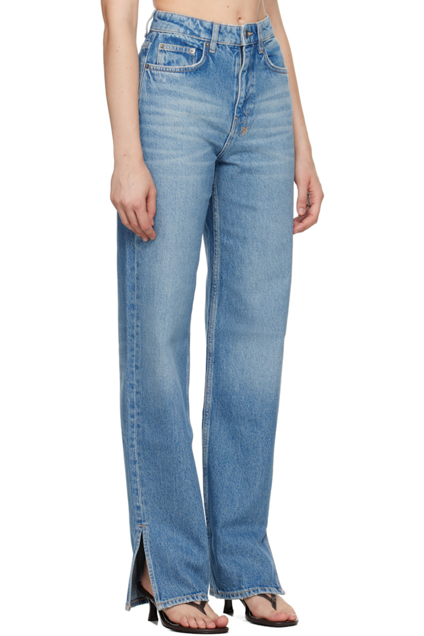 Non-stretch denim jeans.

· Fading, whiskering, and subtle distressing throughout
· Tapered loose-fit
· High-rise
· Belt loops
· Five-pocket styling
· Zip fly
· Vented cuffs
· Logos embroidered at back waistband and leg
· Logo-engraved antiqued silver-tone hardware
· Contrast stitching in beige

Supplier color: Tru vintage