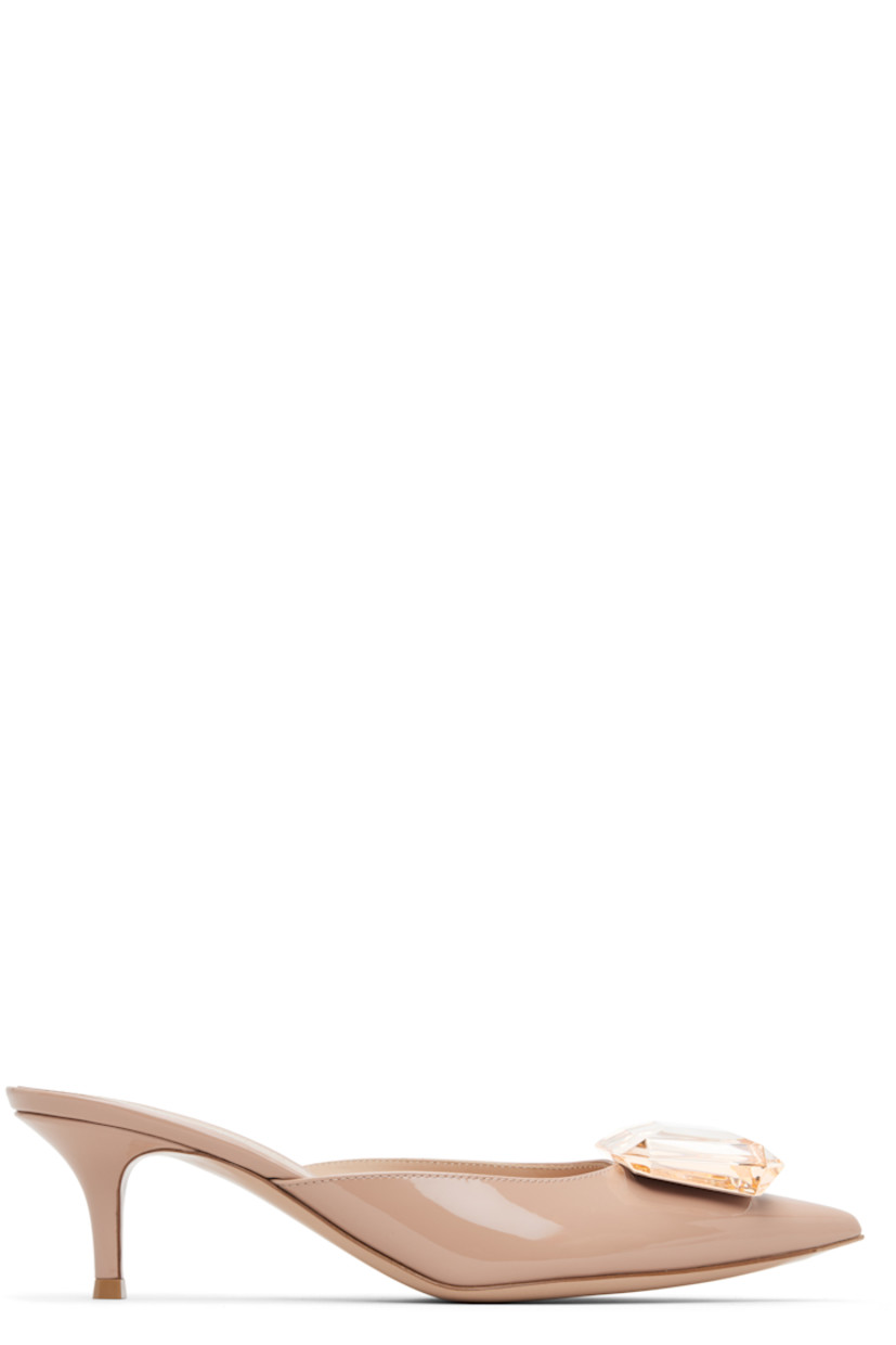 Handcrafted patent calfskin heels.

· Pointed toe 
· Crystal-cut accent at vamp
· Logo printed at padded footbed
· Covered kitten heel with rubber injection
· Leather sole
· Heel: H2.5"

Supplier color: Peach