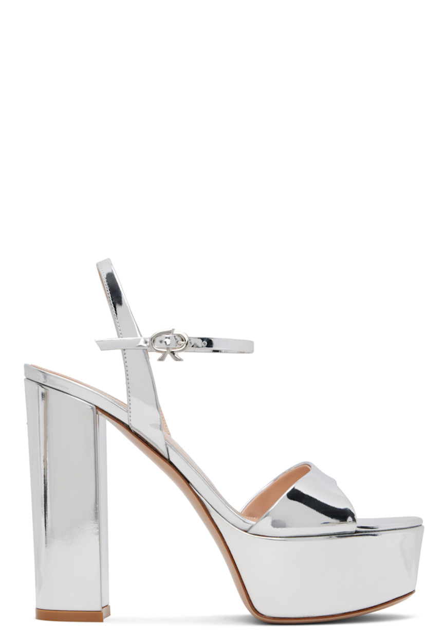 Patent leather heeled sandals in silver tone. 

· Open toe
· Pin-buckle ankle strap and slingback strap
· Logo stamp at leather footbed
· Covered platform midsole
· Covered block heel with rubber injection
· Leather sole
· Platform: H1.75"
· Heel: H5"

Supplier color: Metal silver