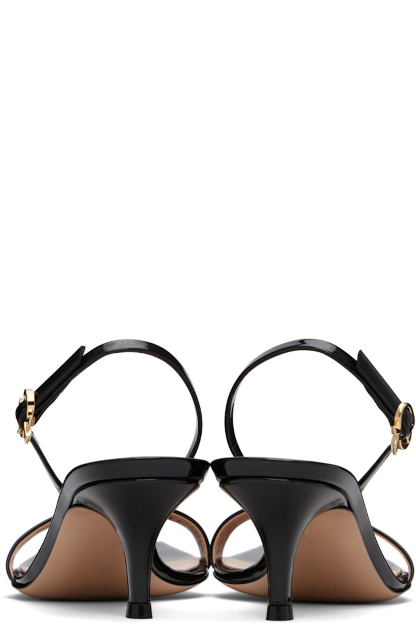 Handcrafted patent calfskin heeled sandals in black. 

· Open square toe
· Strap at vamp
· Logo hardware at pin-buckle slingback strap
· Logo stamp at padded leather footbed
· Covered kitten heel with rubber injection
· Polished leather sole
· Heel: H2"

Supplier color: Black