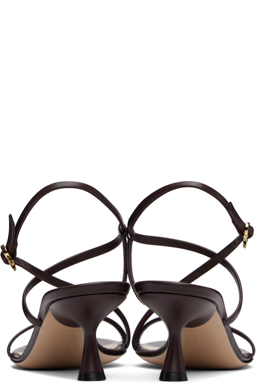 Buffed leather heeled sandals in brown.

· Open toe
· Crisscrossing pin-buckle slingback strap
· Logo stamp at leather footbed
· Covered spool heel with rubber injection
· Polished leather sole
· Heel: H2.5"

Supplier color: Vitello glove bourgogne