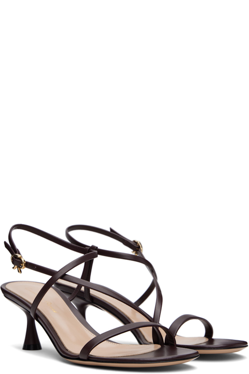 Buffed leather heeled sandals in brown.

· Open toe
· Crisscrossing pin-buckle slingback strap
· Logo stamp at leather footbed
· Covered spool heel with rubber injection
· Polished leather sole
· Heel: H2.5"

Supplier color: Vitello glove bourgogne