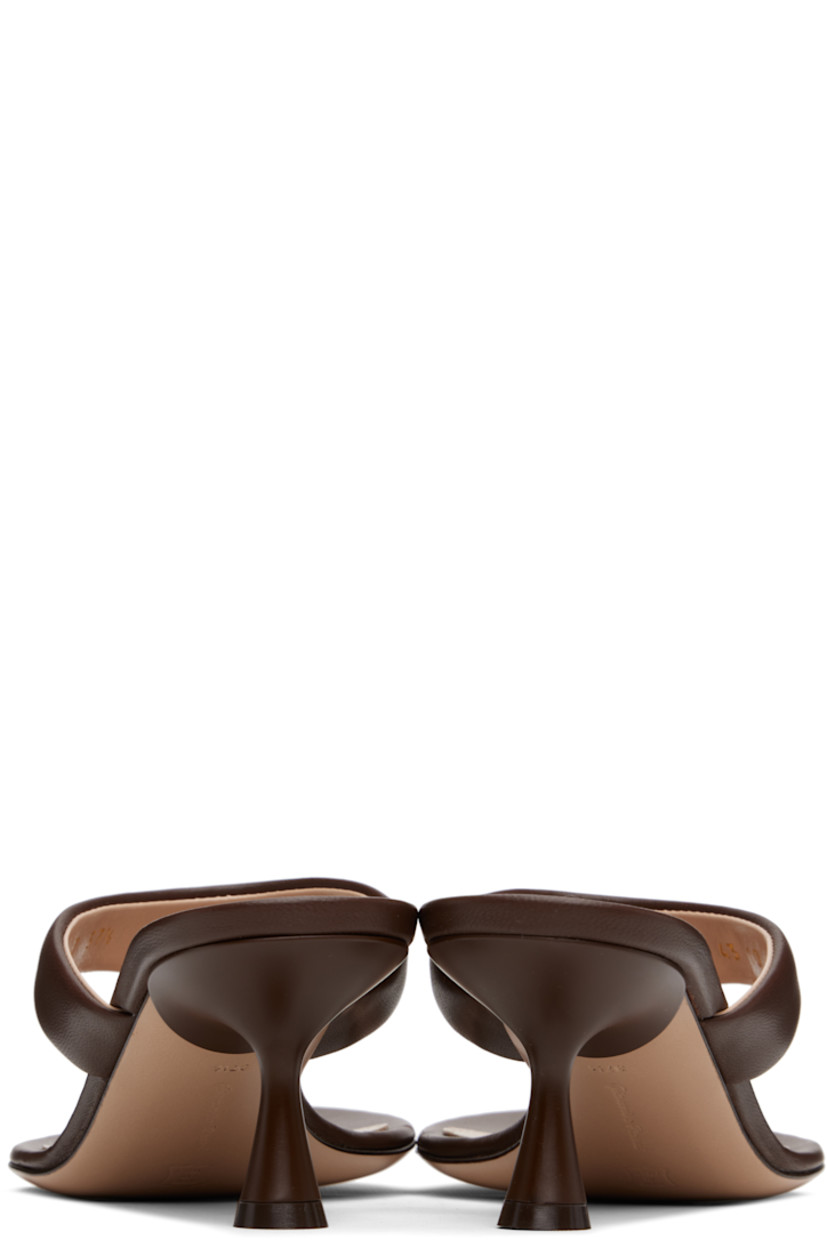 Handcrafted buffed nappa leather heeled sandals in brown. 

· Open toe
· Thong-style strap with logo hardware at vamp
· Logo stamp at leather footbed
· Covered spool heel with rubber injection
· Polished leather sole
· Heel: H2.5"

Supplier color: Nappa brown