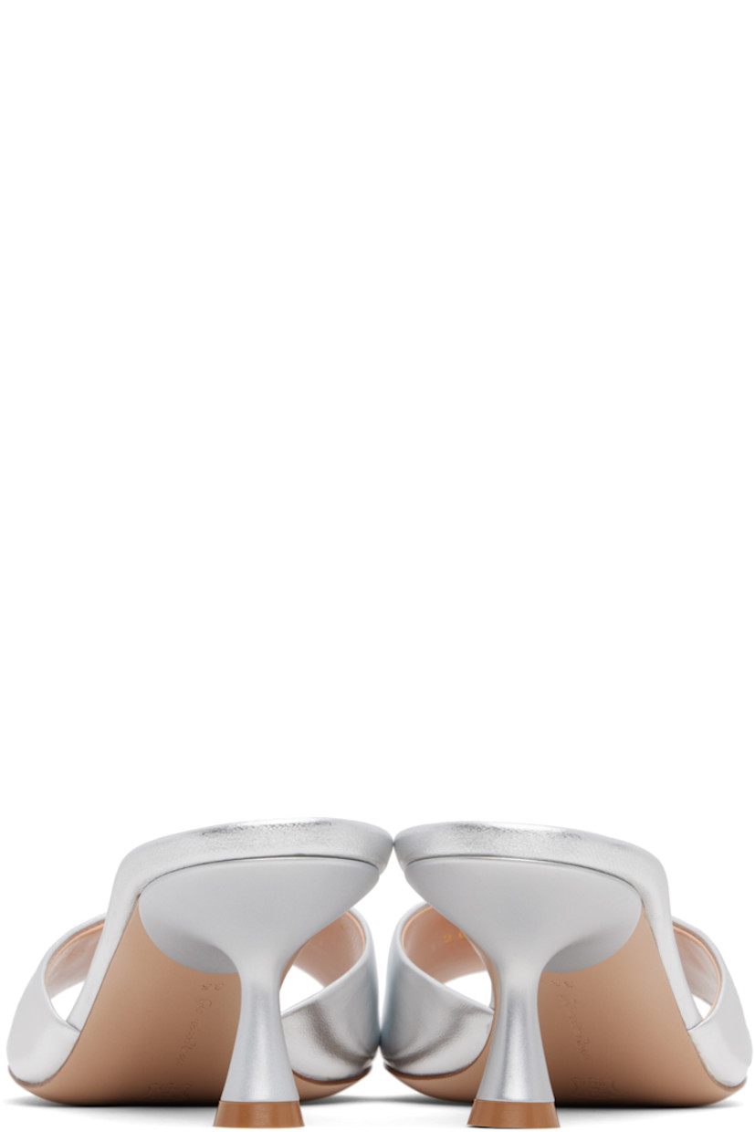 Handcrafted grained nappa leather mules in silver tone. 

· Open toe
· Logo hardware at vamp
· Logo stamp at padded leather footbed
· Covered kitten heel with rubber injection
· Polished leather sole
· Heel: H2.5" 

Supplier color: Silver nappa
