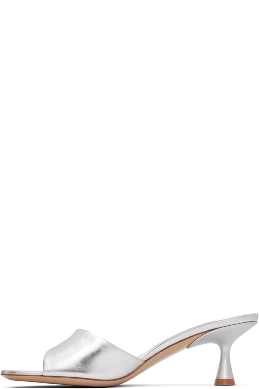 Handcrafted grained nappa leather mules in silver tone. 

· Open toe
· Logo hardware at vamp
· Logo stamp at padded leather footbed
· Covered kitten heel with rubber injection
· Polished leather sole
· Heel: H2.5" 

Supplier color: Silver nappa