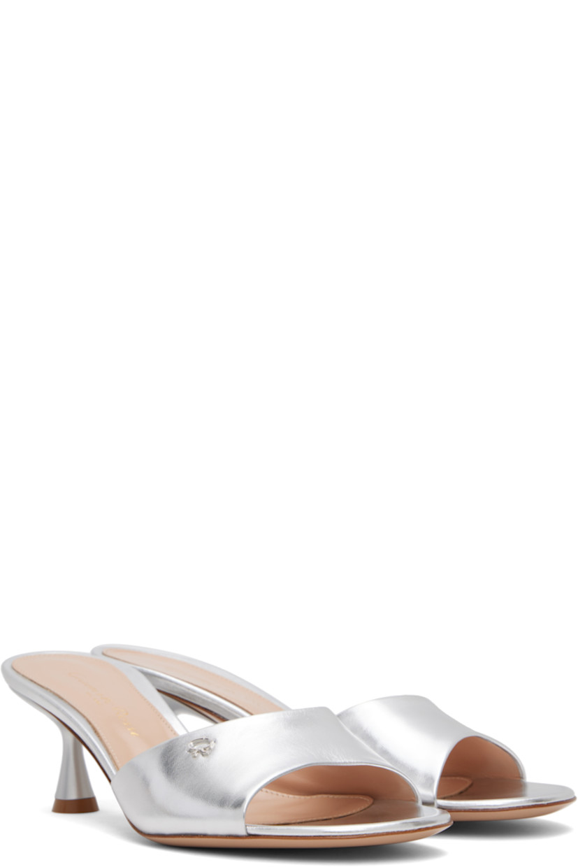 Handcrafted grained nappa leather mules in silver tone. 

· Open toe
· Logo hardware at vamp
· Logo stamp at padded leather footbed
· Covered kitten heel with rubber injection
· Polished leather sole
· Heel: H2.5" 

Supplier color: Silver nappa