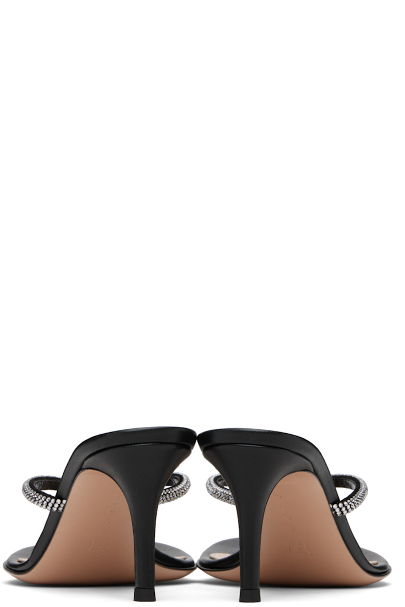 Handcrafted buffed leather heeled sandals.

· Open toe
· Thong-style strap and crystals at vamp
· Logo stamp at padded footbed
· Covered stiletto heel with rubber injection
· Leather sole
· Heel: H2.5"

Supplier color: Black/Black