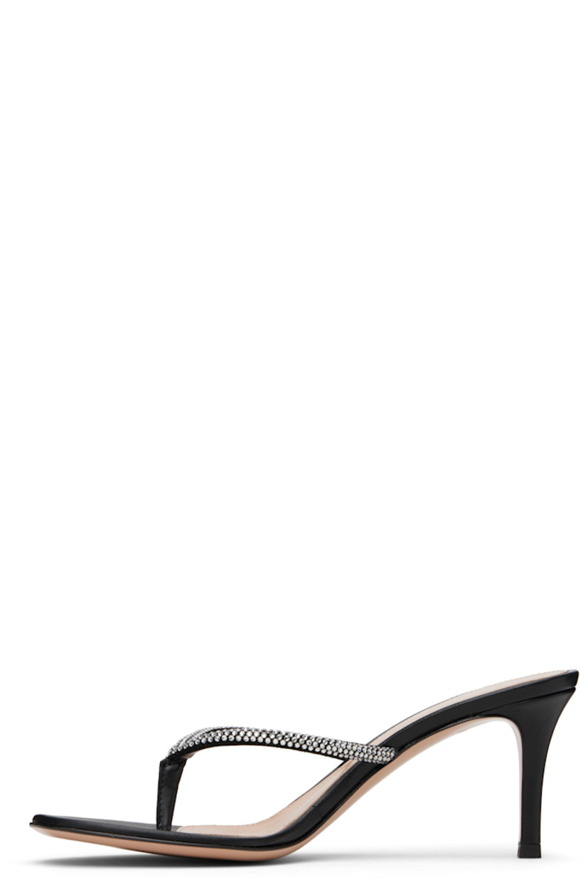 Handcrafted buffed leather heeled sandals.

· Open toe
· Thong-style strap and crystals at vamp
· Logo stamp at padded footbed
· Covered stiletto heel with rubber injection
· Leather sole
· Heel: H2.5"

Supplier color: Black/Black