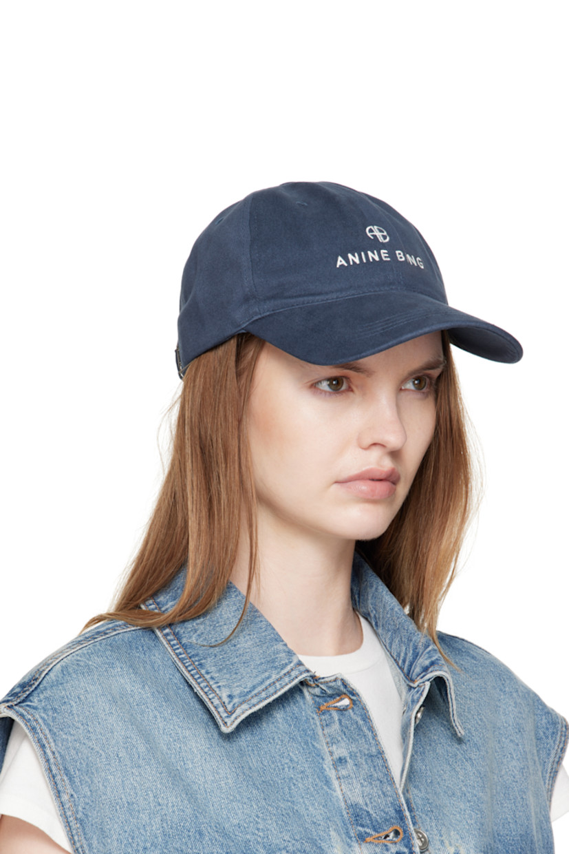 Handcrafted cotton twill cap.

· Embroidered eyelets at crown
· Logo embroidered at face and back
· Curved brim
· Cinch fastening

Supplier color: Dark blue