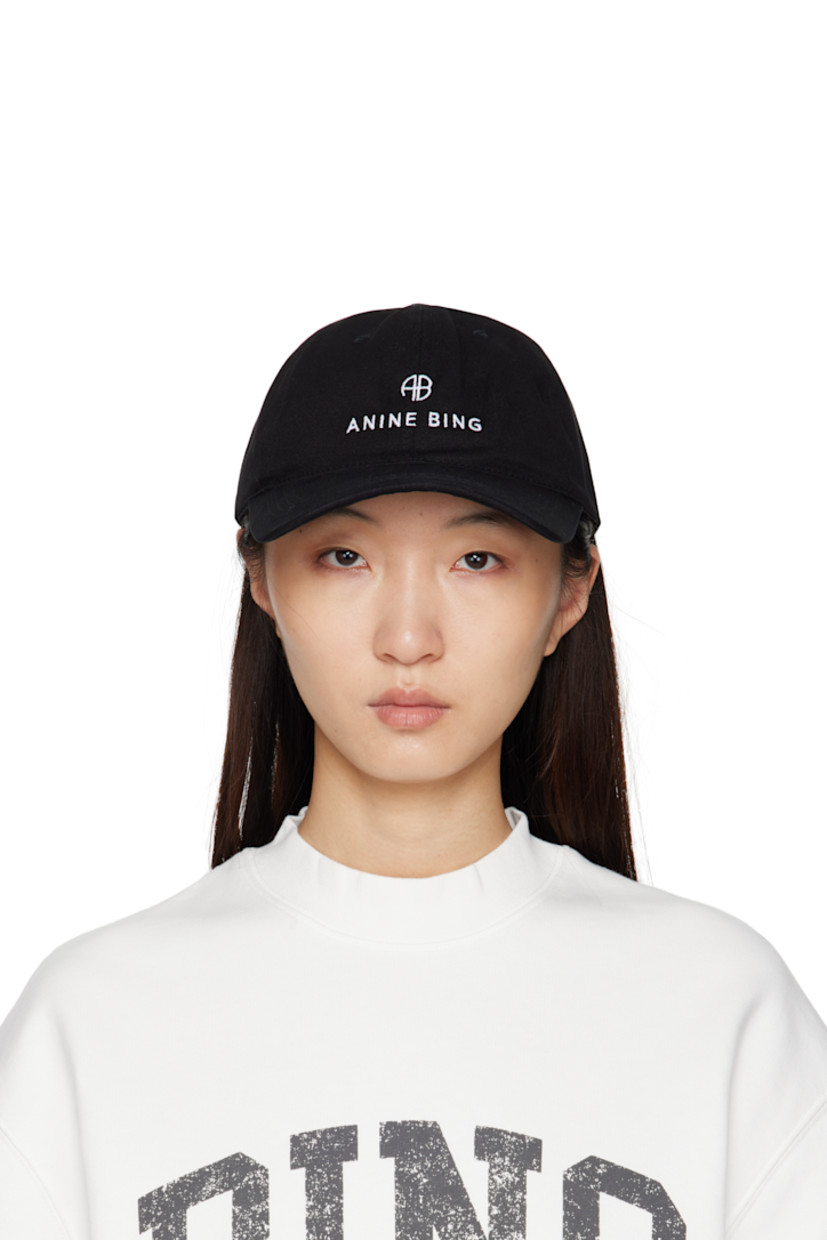 Cotton twill cap.

· Embroidered eyelets at crown
· Logo embroidered at face and back face
· Curved brim
· Cinch fastening

Supplier color: Black