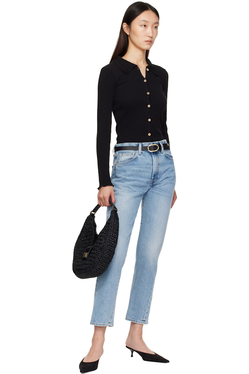 Handcrafted woven cellulose shoulder bag. 

· Buffed leather trim throughout
· Fixed shoulder strap
· Logo hardware at magnetic press-stud tab closure 
· Unlined
· Gold-tone hardware
· H6" x W10.5" x D2"

Supplier color: Black