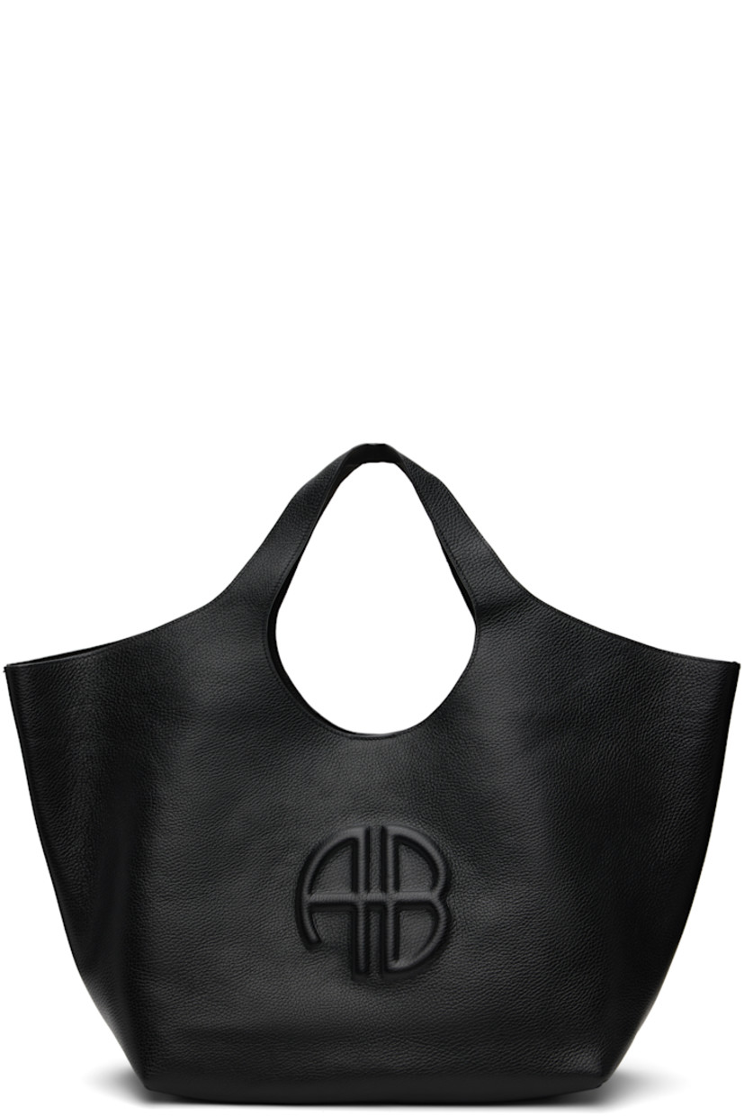 Pebble-grained leather tote.

· Integrated twin shoulder straps
· Logo embossed at face
· Magnetic closure
· Patch and zip pockets at interior 
· Bonded faux-suede lining
· Logo-engraved gold-tone hardware
· H10.5" x W23" x D6.5"

Supplier color: Black